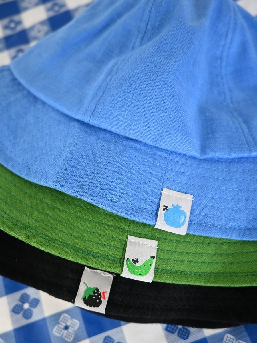 "Fruit & Ant" Linen bucket hat. Designed by HO HOS HOLE IN THE WALL brand. Made in NYC.